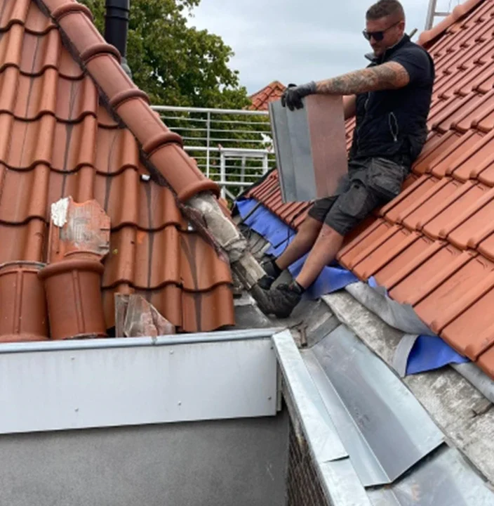 zinken dakgoot vervangen in leiden